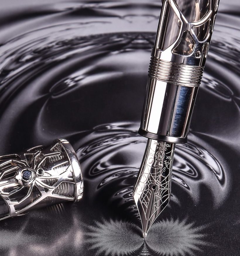 Inline Image - Magical Black Widow, 88, limited edition white gold coloured skeleton fountain pen, no. 09/88, circa 2004, stamped 750, the cap with a spider clip set with two black diamonds and a mother of pearl emblem, the medium nib stamped 18K 750, piston filling system, uninked, est. £8,000-12,000