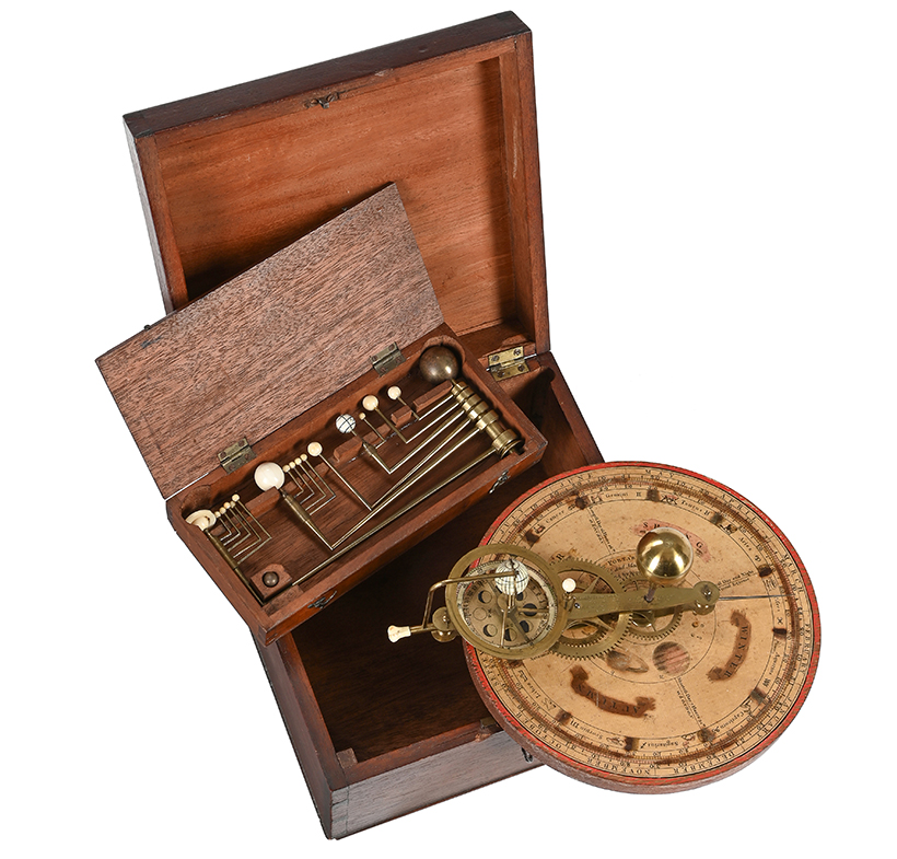 Inline Image - Lot 1001: A fine Regency lacquered brass and mahogany 'portable orrery' and tellurian, William Jones, London, circa 1815 | Est. £3,000-5,000 (+ fees)