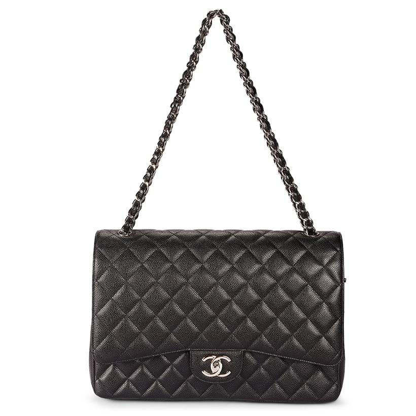 Inline Image - Chanel, Maxi Classic, a black caviar Flap bag, no. 15986861, circa 2011 | Sold for £4,000
