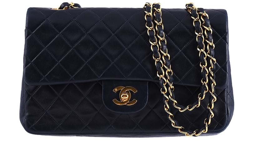 Inline Image - Chanel, classic Flap a navy quilted handbag | Sold for £2,268