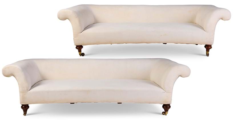 Inline Image - Lot 313: A matched pair of walnut and upholstered sofas, one circa 1860, possibly by Gillows, the other modern by Howard Chairs Ltd | Sold for £24,570