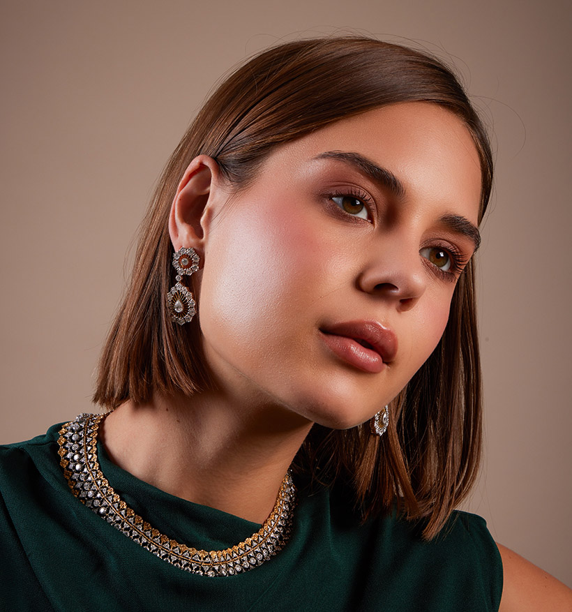 Inline Image - Lot 135: Buccellati, a pair of diamond earrings | Sold for £25,400 & Lot 136: Buccellati, a diamond collar necklace | Sold for £75,800