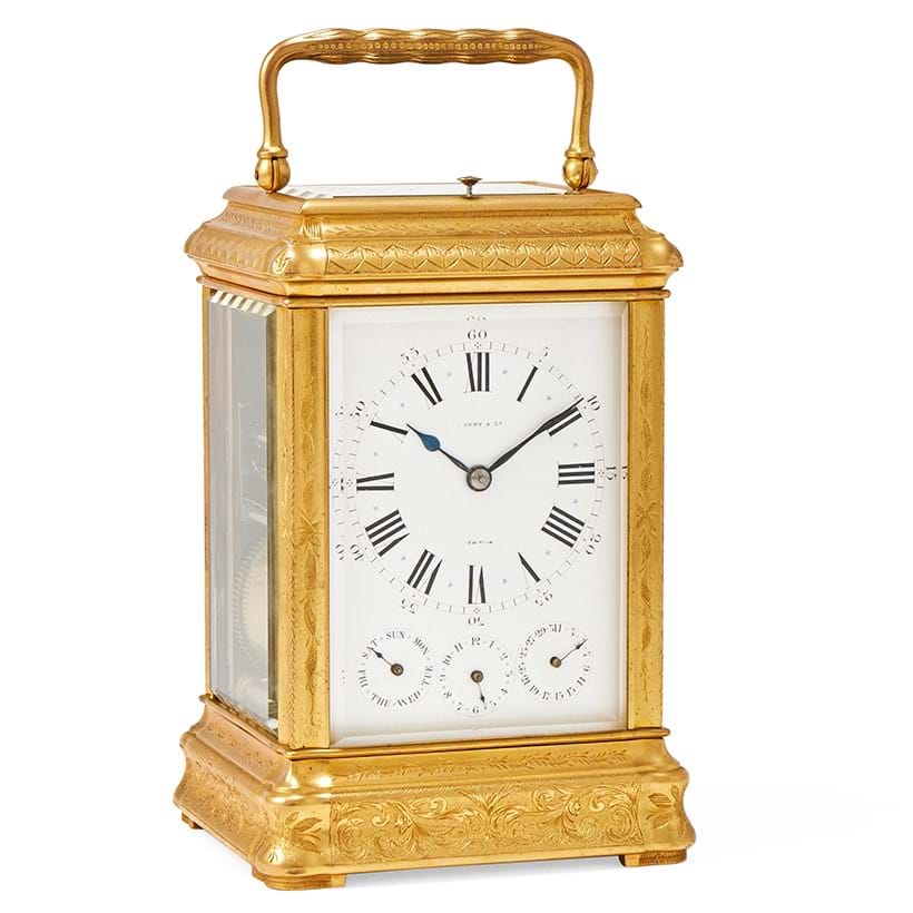 Inline Image - A fine French giant engraved gilt gorge cased grande-sonnerie alarm carriage clock with calendar, retailed by Tiffany and Company, New York, circa 1890 | Sold for £8,636