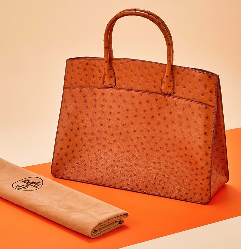 Inline Image - Hermes, white bus 40, a cognac ostrich handbag, circa 2000 | Sold for £3,550