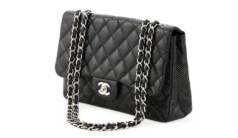 Inline Image - Chanel, classic flap a black perforated lambskin handbag | Sold for £2,540