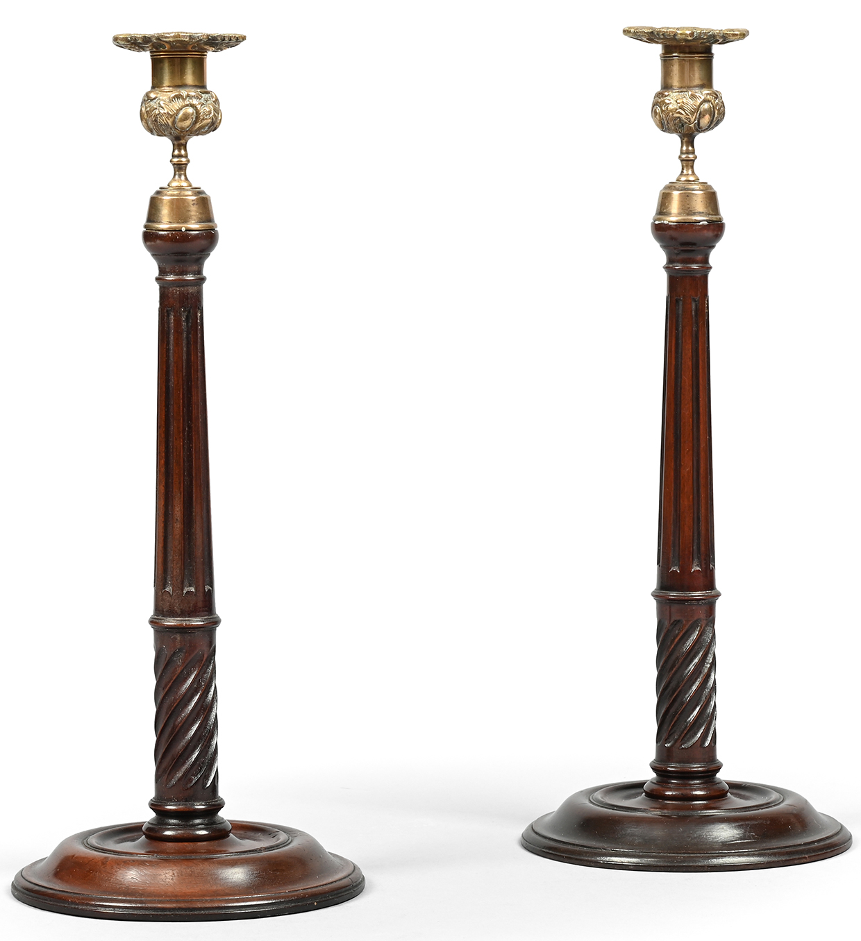 Inline Image - 1172: A pair of George III mahogany candlesticks, in Scottish style, 19th century | Est. £500-700 (+ fees)