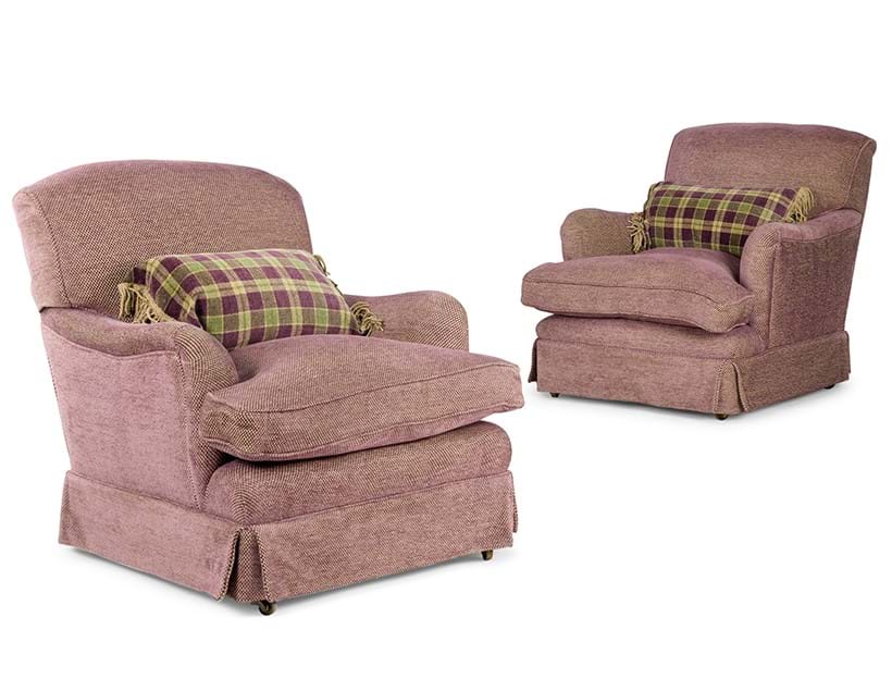 Inline Image - Lot 64: A matched pair of Howard & Sons 'Bridgewater' armchairs late 19th or early 20th century | Sold for £13,970