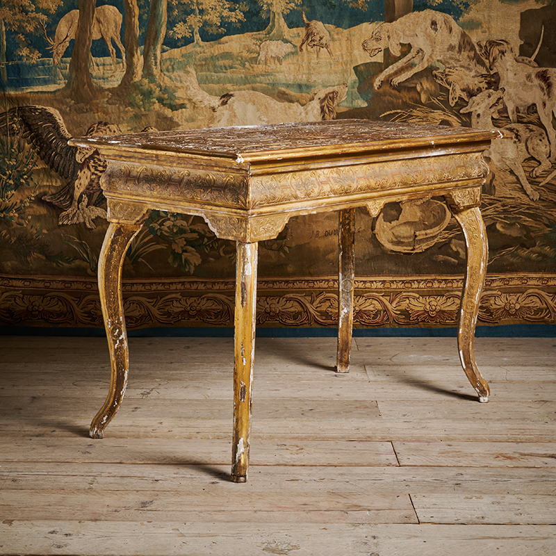 A George I gilt gesso side table, in the manner of James Moore, circa 1720