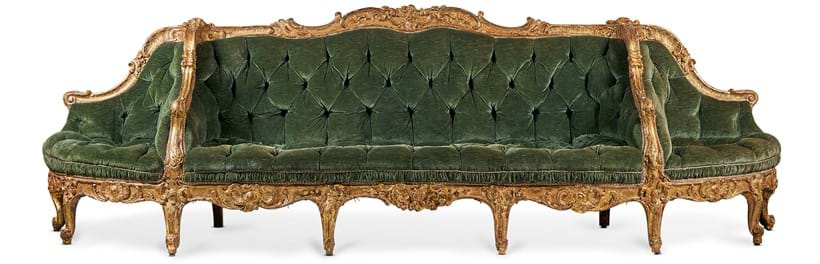 Inline Image - Lot 433: A large Continental carved giltwood sofa or canapé à confidents, mid 18th century | Sold for £37,500